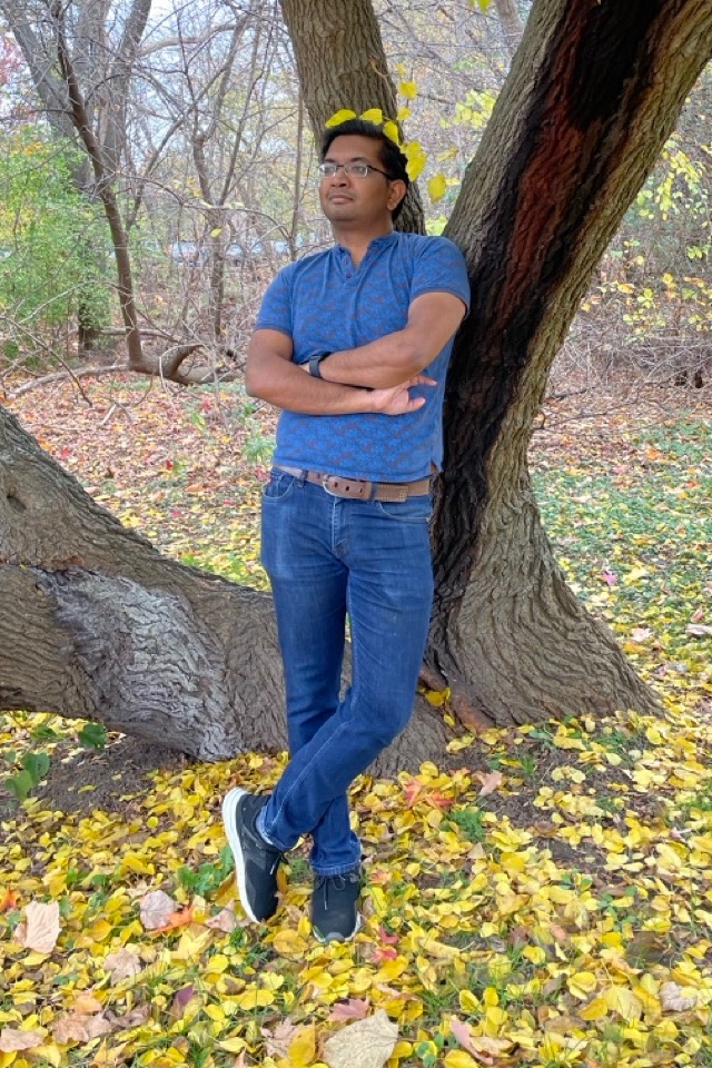 Me standing in front of a tree in the Fall